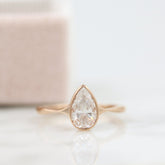 1.33 CT Pear Cut Bezel Solitaire Moissanite Engagement Ring 1